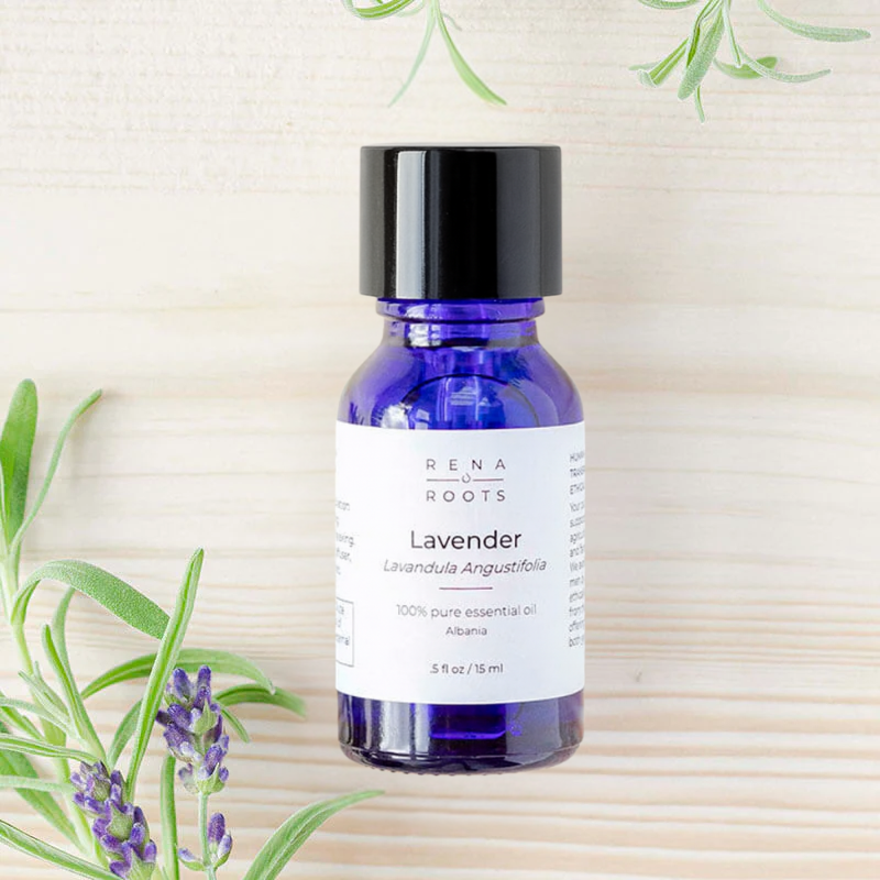Pure Lavender Essential Oil bottle with lavender sprigs – organic, calming aromatherapy oil for sleep and stress relief