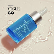 Blue Rena Roots Afghan Rose Serum bottle with dropper on a beige background.